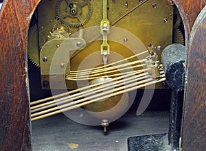 The chiming mechanism of an old clock photo