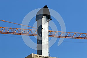 Chimney against blue sky