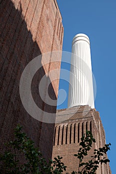 Chimney at Battersea Power Station, renovated interwar building, now a mixed use retail and residential scheme.