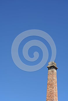 Chimney with blue sky.