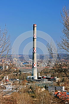 Chimney, blue sky and industrial area