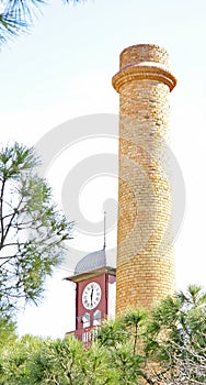 Chimney and clock tower in El Clot, Barcelona