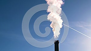 A chimney of a combined heat and power plant