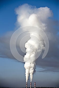 Chimney expelling pollutant gases to the air