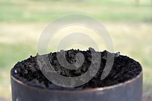 Chimney flue pipe covered with a thick layer of soot.