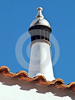 Chimney on a house in Portugal with blue sky