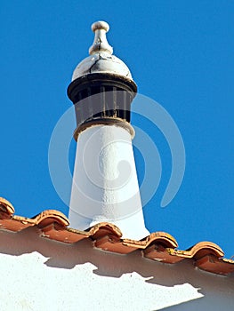 Chimney on a house in Portugal with blue sky