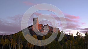 Chimney Rock Colorado Timelapse Day to Night Sunset. Red Clouds Dramatic Night Sky