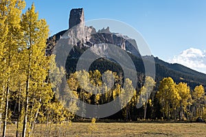 Chimney Rock and Courthouse Mountain in the early autumn of Southern Colorado.