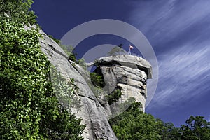 Chimney Rock pinnacle under a clear blue sky.