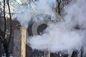 Chimney smoking stack. Air pollution and climate change theme.