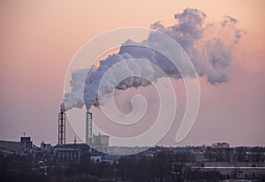 Chimney smoking stack. Air pollution and climate change theme.