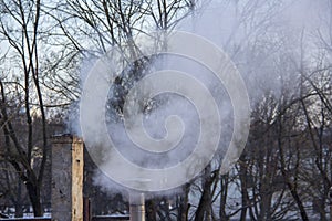 Chimney smoking stack. Air pollution and climate change theme.