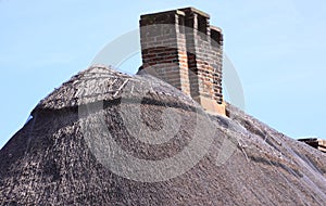 Chimney stack on thatch roof