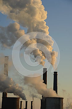 The chimney of a thermal power plant, the smoke extracted by a thermal power plant on the chimney, in the production process. Envi