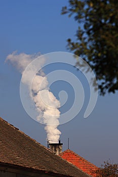 Chimney with white smoke