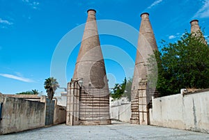 The chimneys of the ancient Cartuja monastery where the artistic tiles were once worked