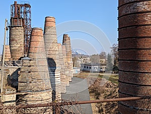 Chimneys of the old abandoned lime kiln factory