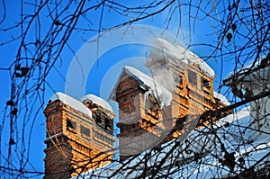 Chimneys old house with snow