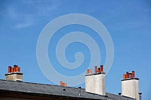 Chimneys on top of a roof