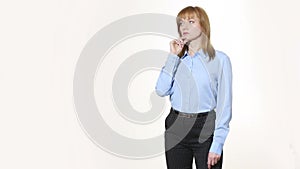 Chin stroking. decision and skepticism. girl in pants and blous. Isolated on white background. body language. women