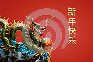China dragon statue on the red background