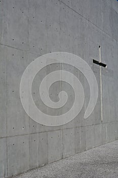 Solemn church with raw concrete, architectural concrete, exposed concrete cross photo