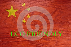 China flag on wooden background for global eco friendly environment, ecological and environmental saving and go green country