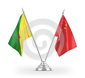 China and French Guiana table flags isolated on white 3D rendering