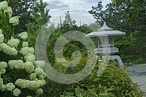 A China Garden Ornament Among The Greenery