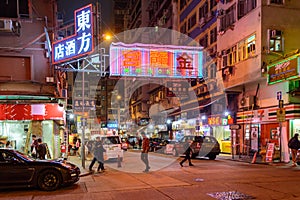 Nightlife on the night streets of Kowloon City in Hong Kong