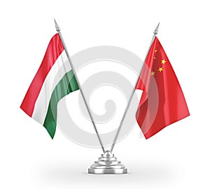 China and Hungary table flags isolated on white 3D rendering