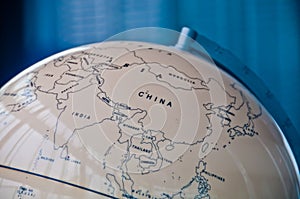 China India and South East Asia countries map in a retro old classic vintage Earth globe in executive management board room