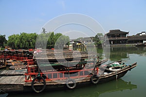 China ,Jinxi Water Village, Dark mat boats at Jinxi ancient Town