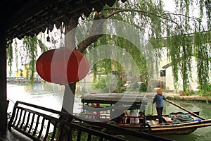 China ,Jinxi Water Villageï¼ŒPeople row a boat