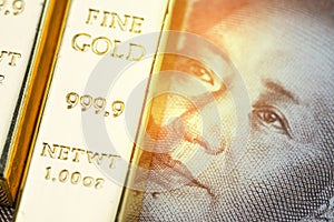 China national gold reserve concept, shiny gold bar bullion ingot on Chinese yuan banknote money with shiny golden flare light, c