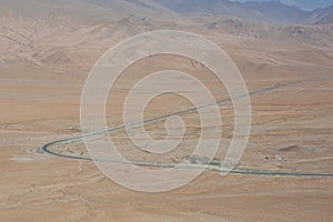 China National Highway 314 - The Karakoram Highway, ChinaÃ¢â‚¬â„¢s Xinjiang region. Truck on the Old Silk road