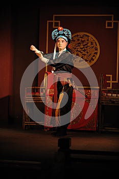 China opera actor with hat