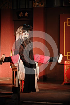 China opera man sit in a chair