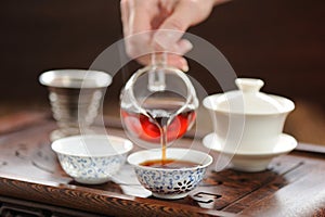 China tea ceremony with puerh tea brewing in haiwan