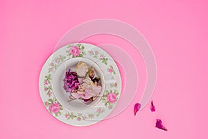 China tea cup filled with dried flower petals