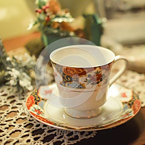 China Tea Cup and Saucer on Doily