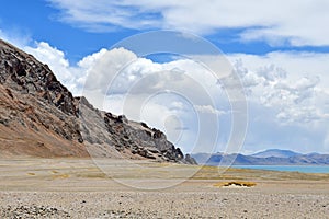 China, Tibet. The shore of lake Tery Tashi Nam Co in summer cloudy day
