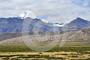 China, Tibet. South face of mount Kailash Kailas in the summer in cloudy day from the side of plateau of Bark