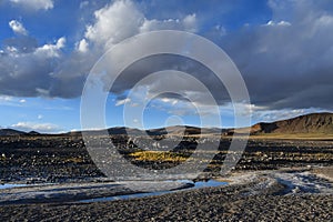 China,Tibet. The store of the lake Teri Tashi Namtso in june under cloudy sky