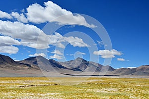 China, Tibetan plateau. Big clouds over the TRANS-Himalayas on the way from Ringtor to Yakra in June in sunny day