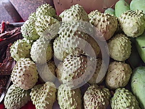 China Yunnan Kunming Xishuangbanna Banna Tropical Fruits Buddha Fruit Green Nature Fresh Market Harvest Street Food Snack