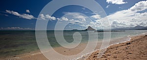 Chinamans Hat {Mokolii Island] as seen from Kualoa Regional Park on the North Shore of Oahu Hawaii USA