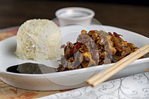 Chineese dish with rice and chicken photo