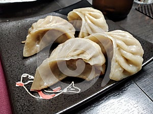 Chinense dumplings or Jiaozi at asian restaurant